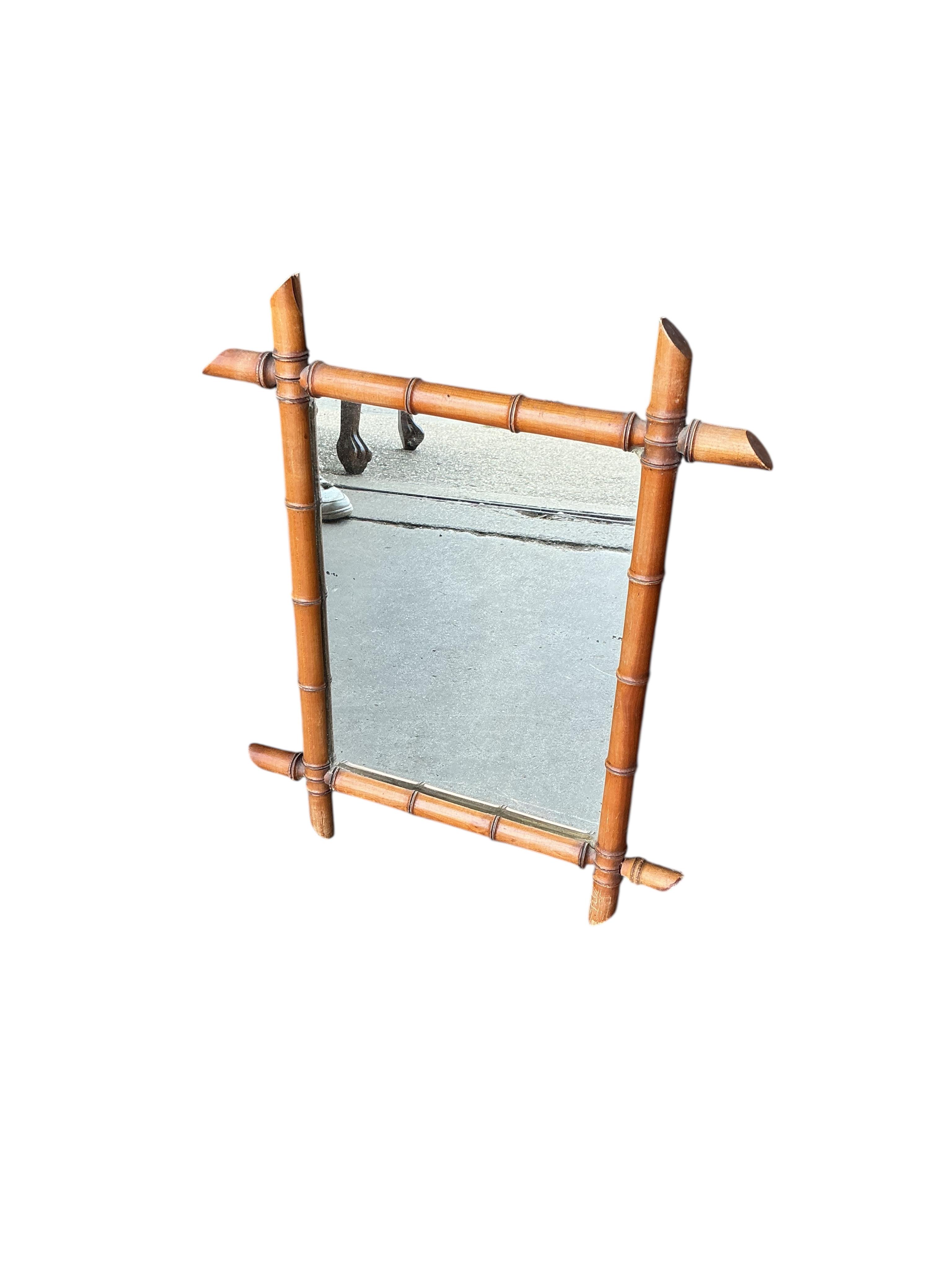 Two early 20th French rectangular faux bamboo wall mirrors, larger width 56cm, height 70cm